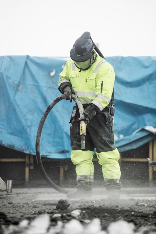 Professional abrasive blasting in progress